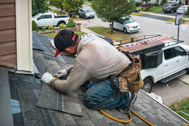 Professional Roof Replacement technician working in Marcola, OR